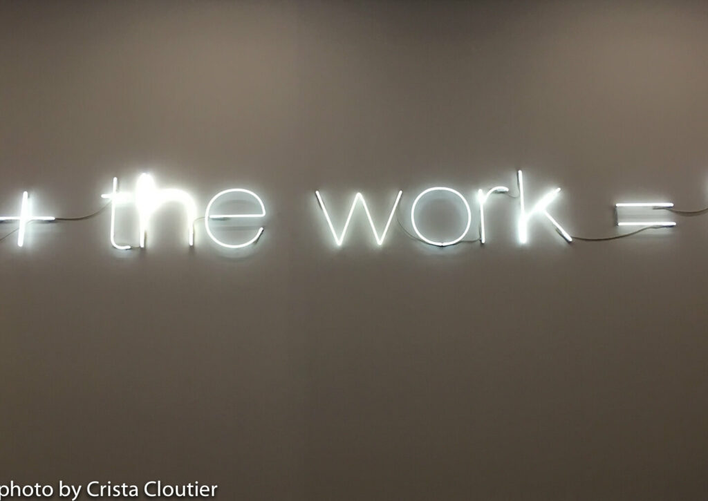 Neon sign that says the work